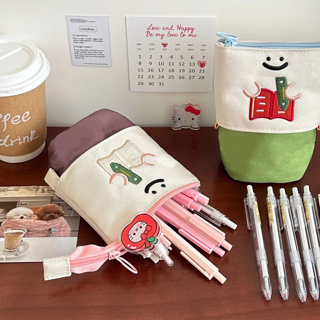 Korean style cartoon collapsible pencil case in Oxford fabric measuring 17cm by 14cm