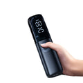 Black portable electric car air pump with tyre pressure gauge and inflation tube