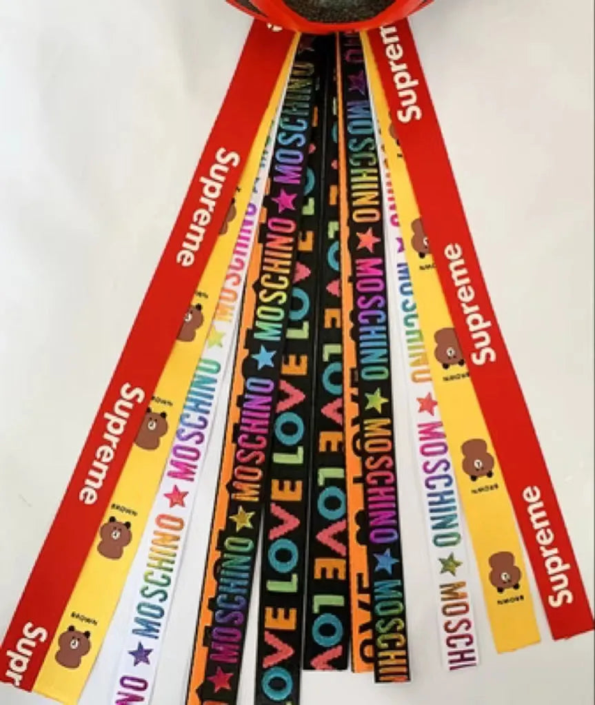 Decorative ribbon streamer for a child's ski or skating helmet in various colour options.