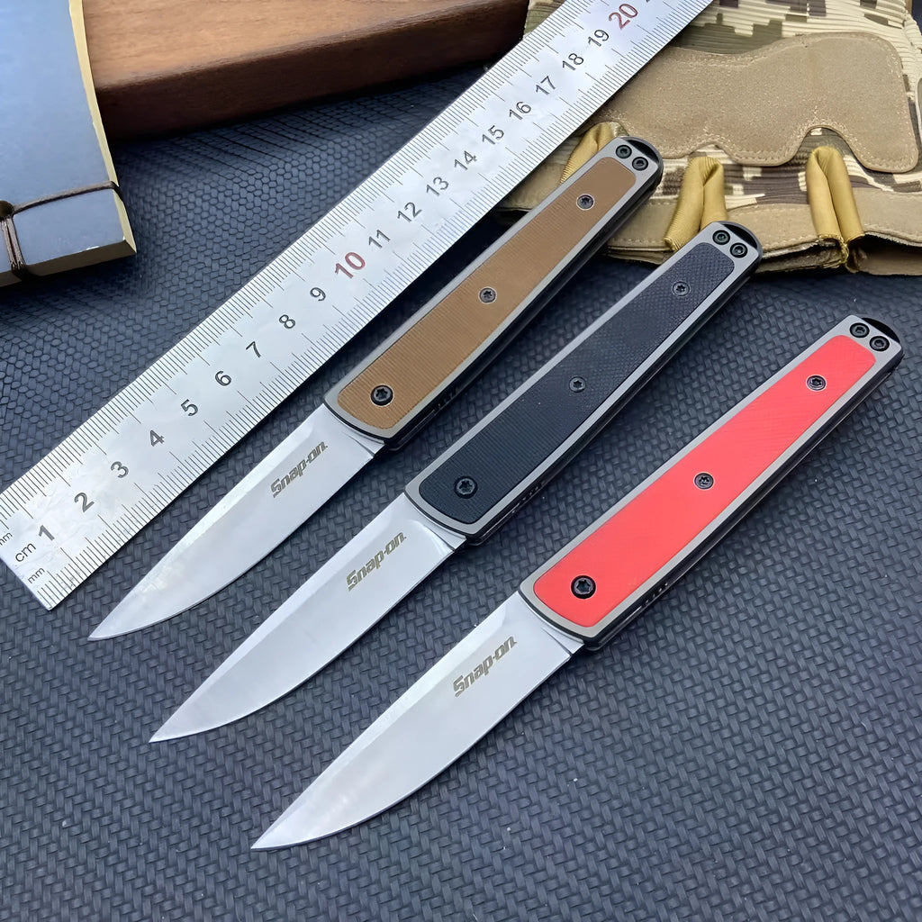 Folding fruit knife with stainless steel blade shown unfolded displaying 7cm blade length and 10cm handle