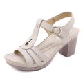 Women's patent leather thick heel sandals with metal buckle stitching in apricot colour