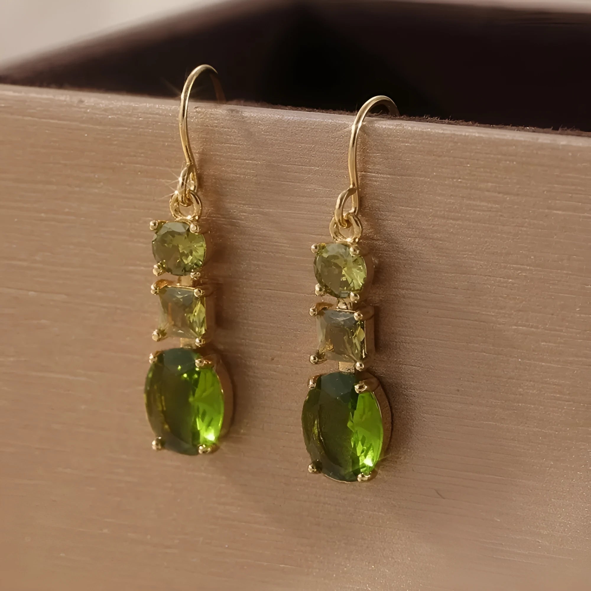 Green geometric quadrilateral copper earrings in a retro Bohemian unisex style.