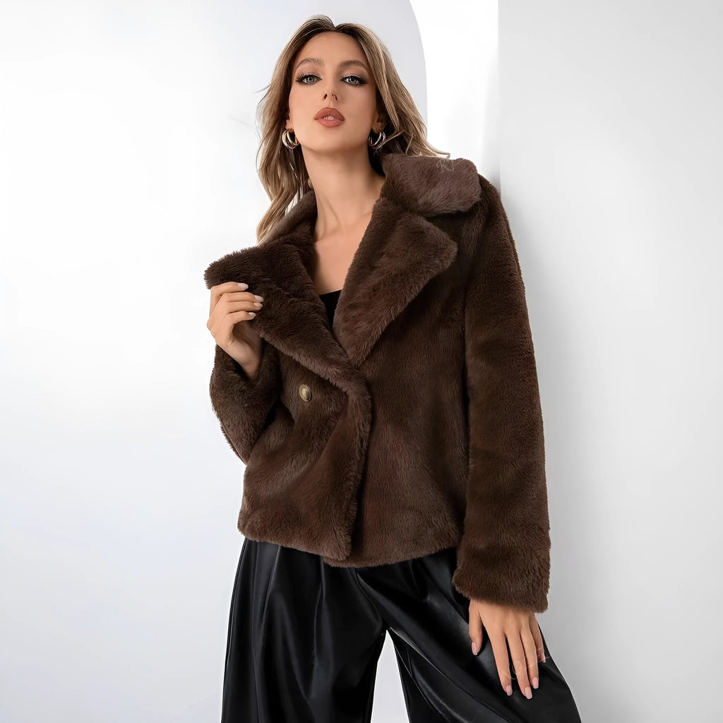 Rose red loose women's faux fur coat with regular sleeves on a hanger