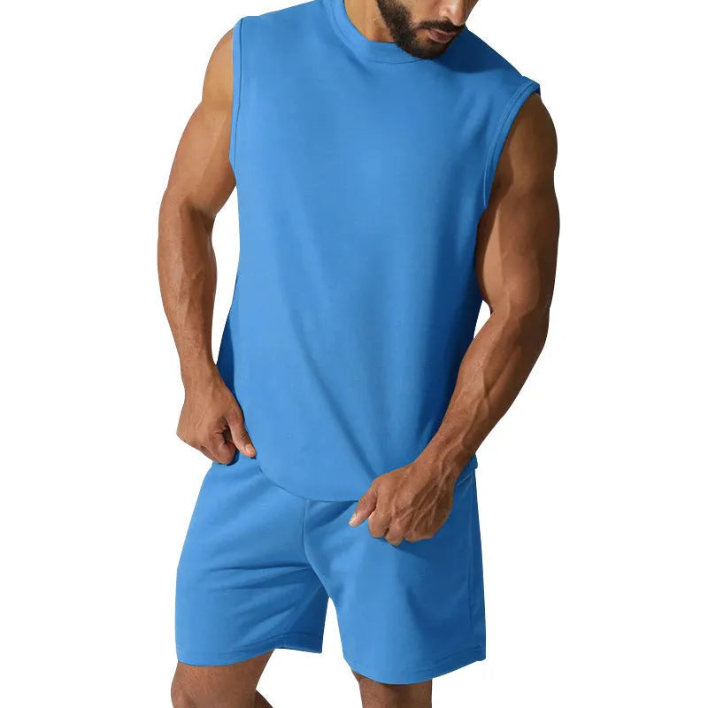 Men's sleeveless sports suit consisting of thin cotton blend top and matching shorts in solid colour