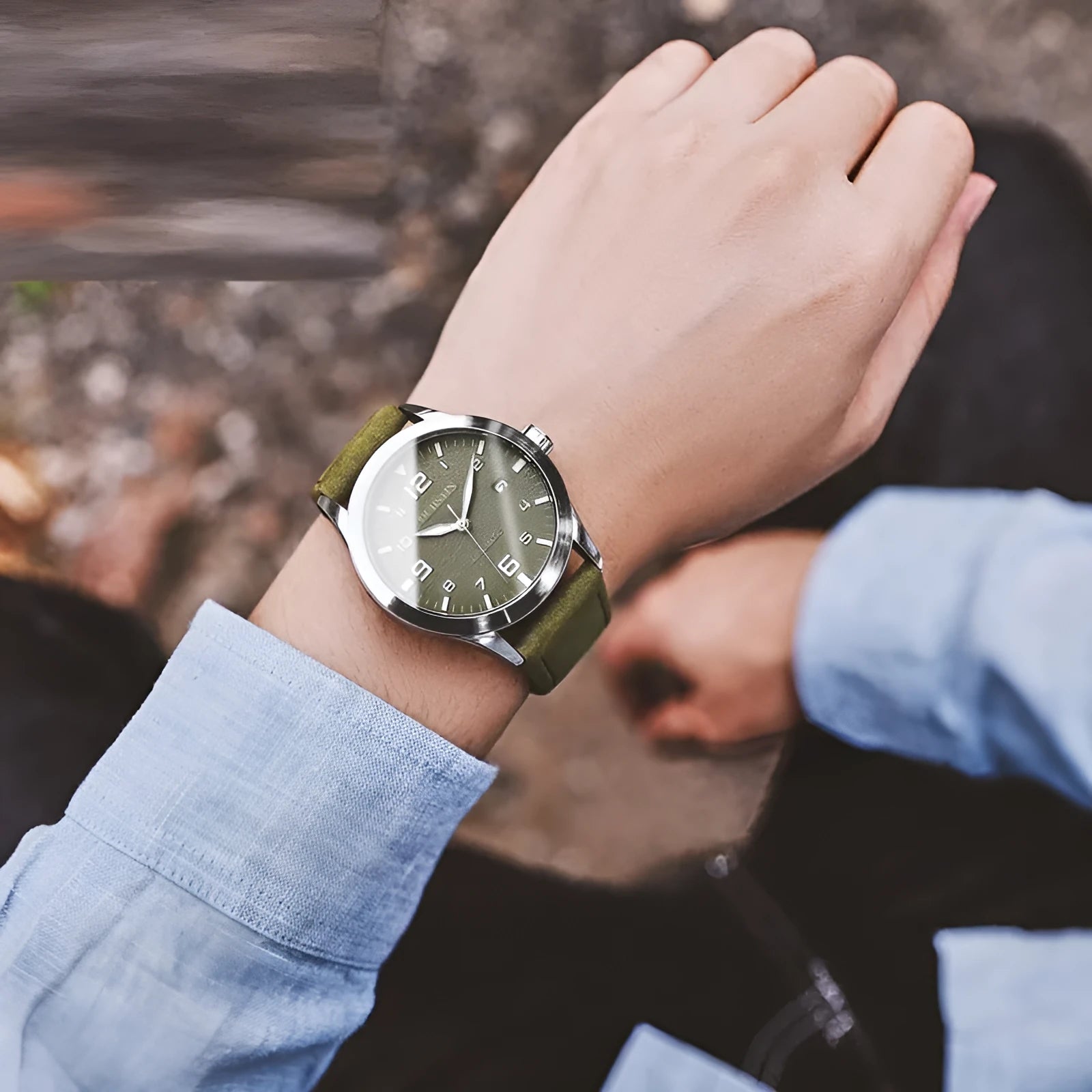 Men's retro automatic mechanical watch with black case and leather strap showing dial detail