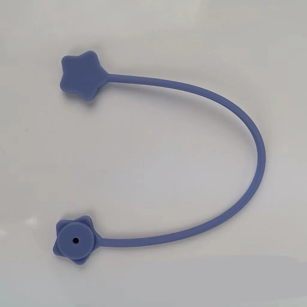 Star-shaped silicone magnet wire winder for organising phone and headphone cables in various colours