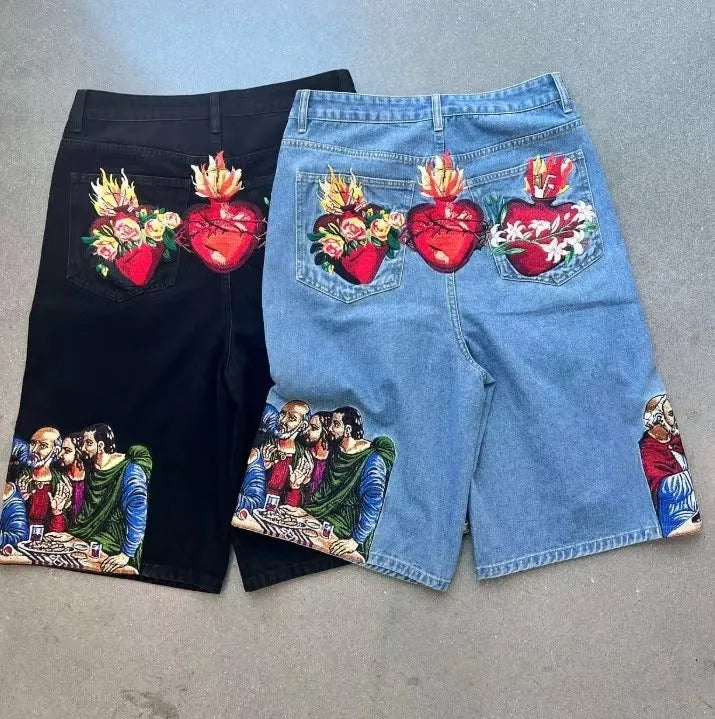 Blue men's cotton tapered shorts showing a Jesus print on the back right pocket.