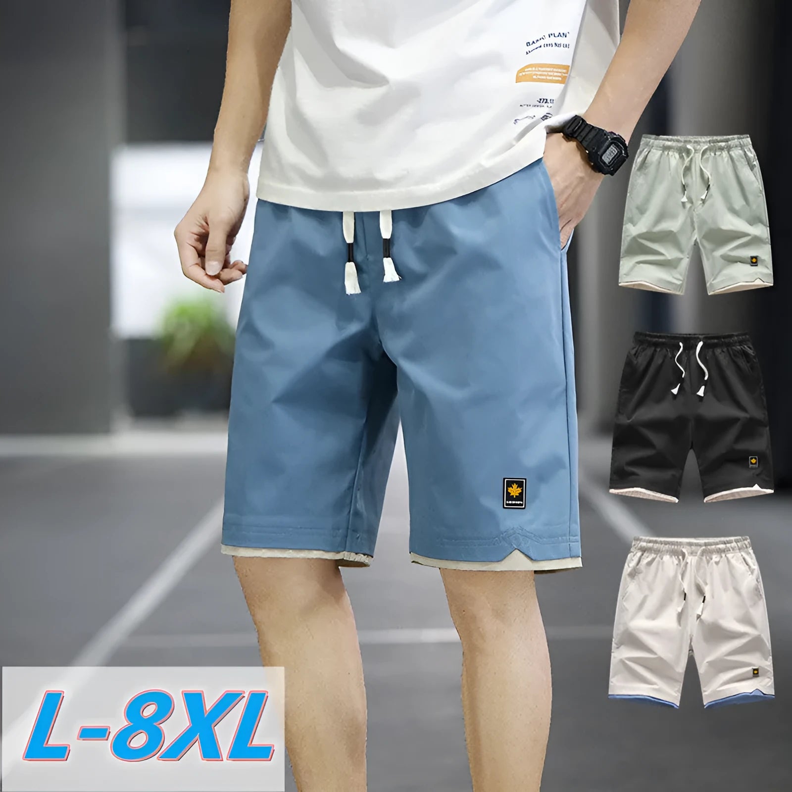 Man wearing loose straight-leg casual shorts in a solid colour on a beach.