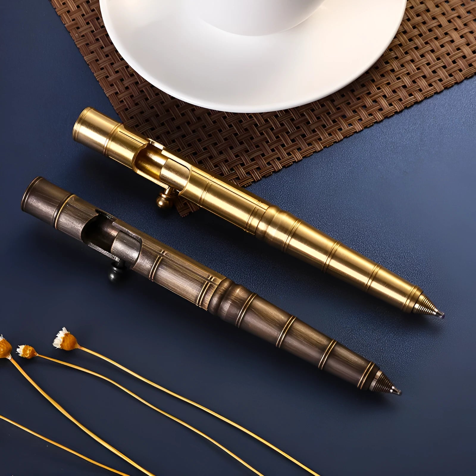 Solid brass bolt-action tactical pen showing its retro design and metallic finish.