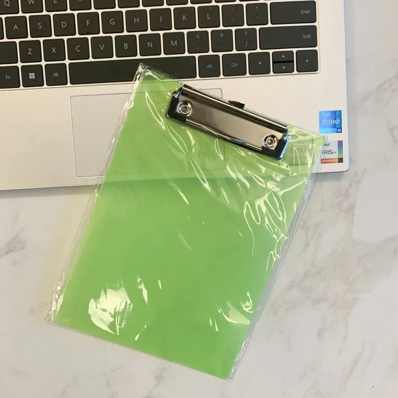 A4 transparent plate holder with metal clip holding documents in office setting