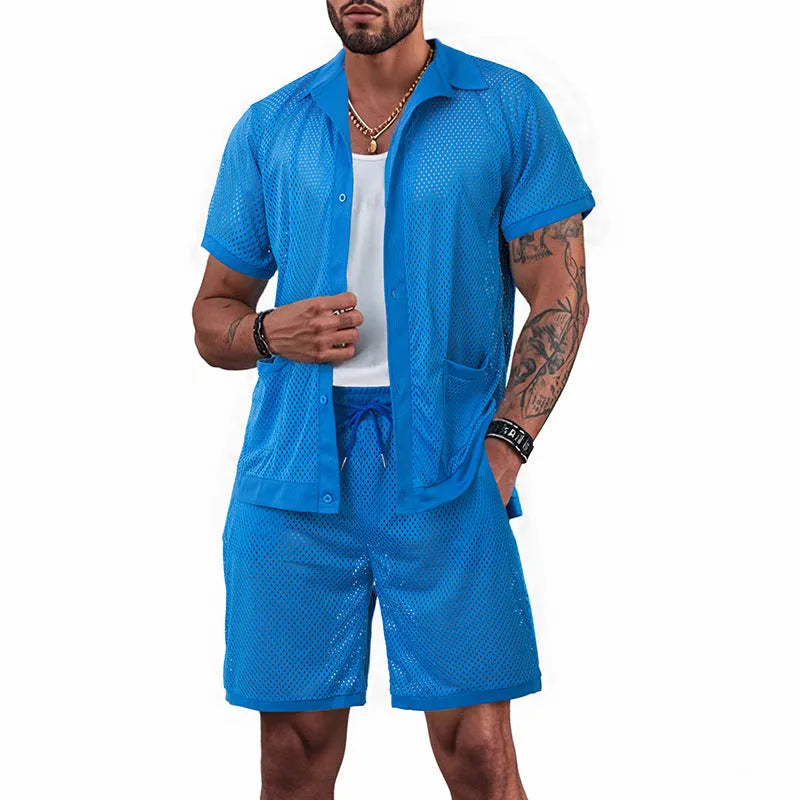 Hawaiian-style beach co-ord set with a white mesh dress over a light grey cardigan and shorts on a mannequin.