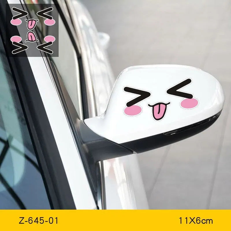 A pair of reflective cartoon car eye stickers on a vehicle body.