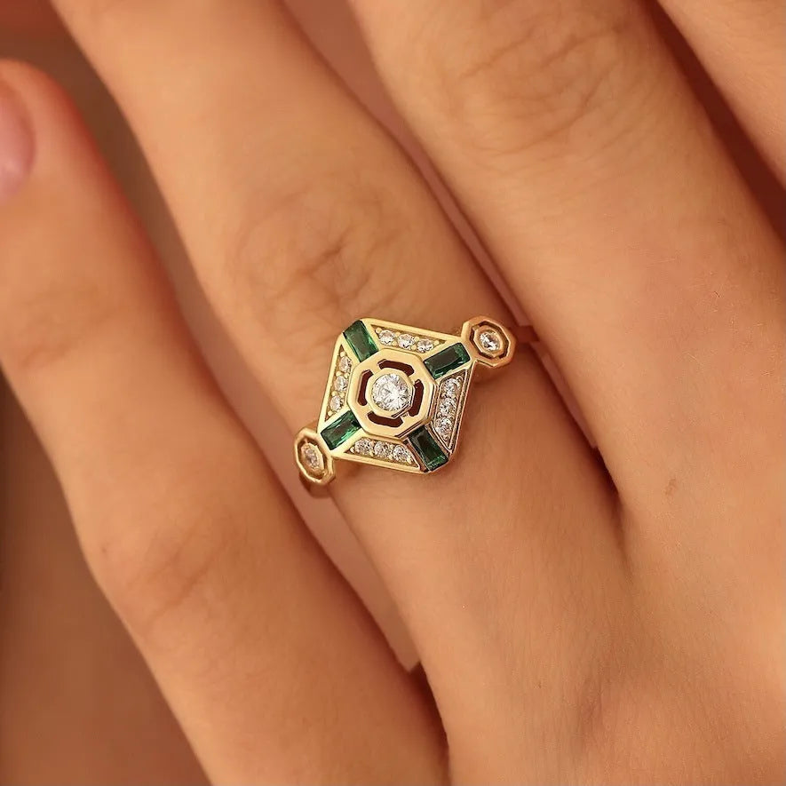 Square emerald cut diamond ring in lvzuan colour on a model finger, showing geometric Ins style.
