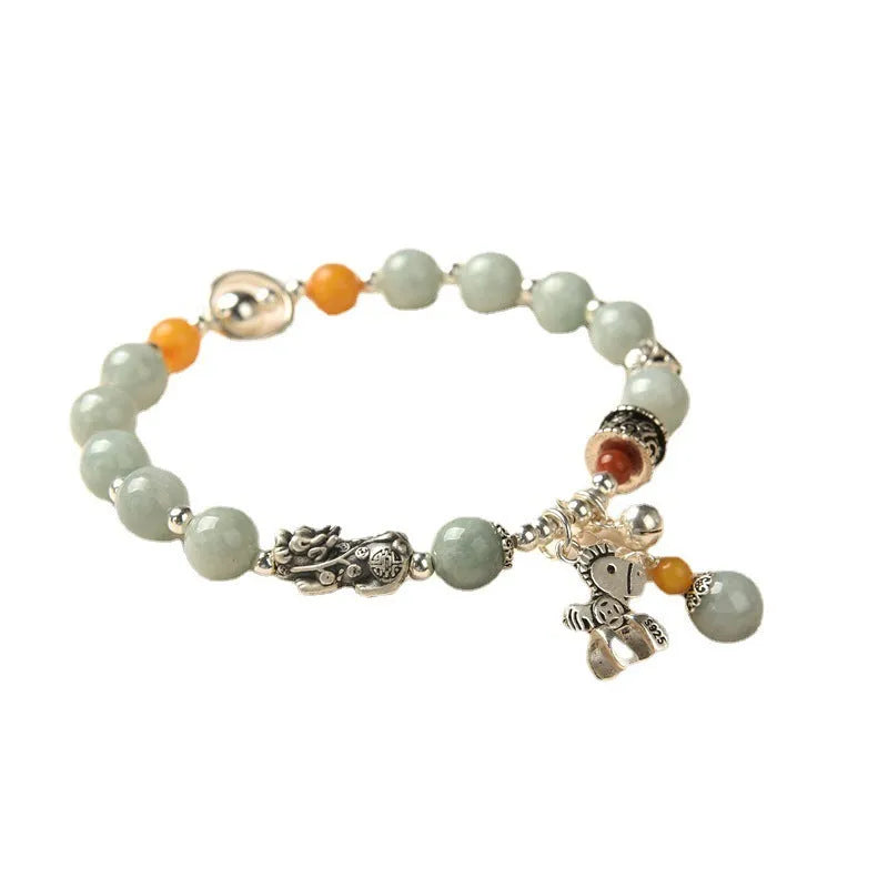 Natural jade vintage bracelet with 8-9mm beads and alloy metal accents on wrist