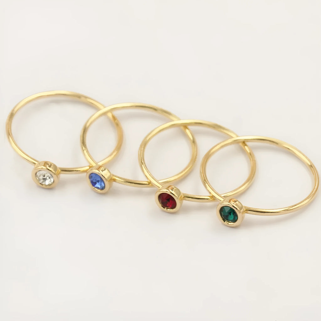 Women's knuckle ring with gilded GF setting and zircon stones on adjustable copper band