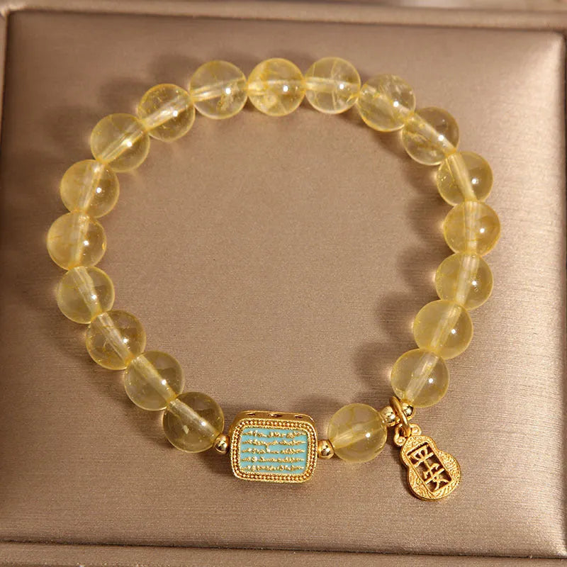 Women's natural yellow citrine crystal bracelet with rhinestone decorative details