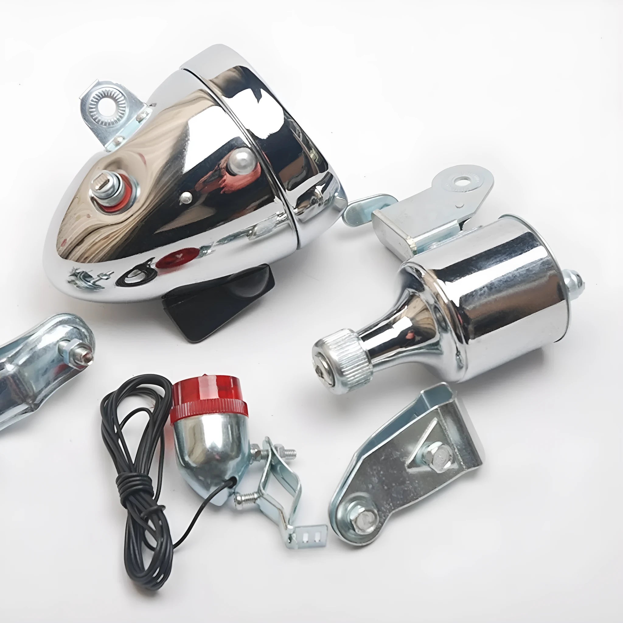 Silver bicycle dynamo light kit with generator head for friction drive mounting on bicycle frame