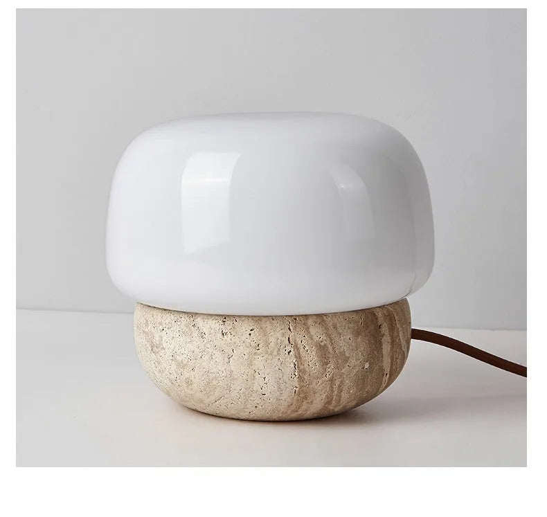 Cream coloured retro style bedside lamp with a button switch, measuring 18cm by 17cm.