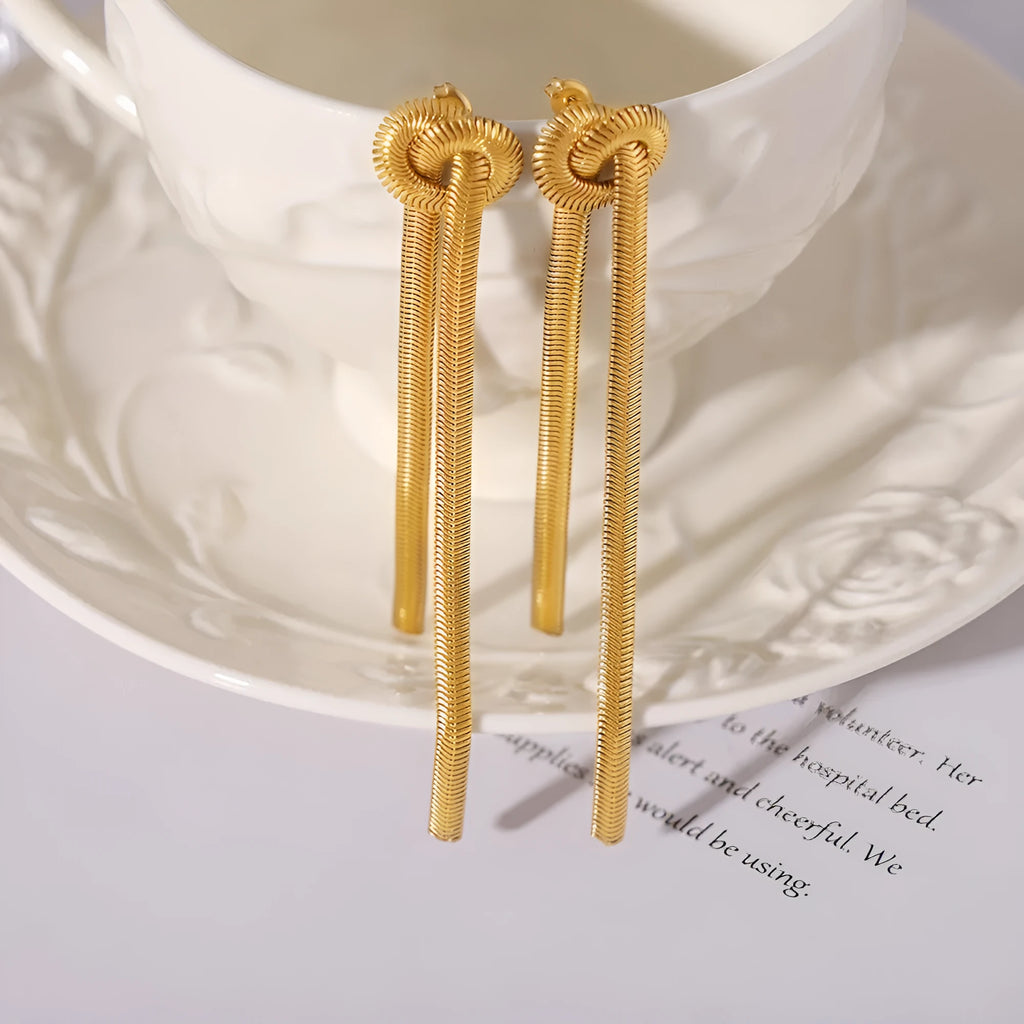 Gold titanium steel necklace with knotted tassel pendant and matching earrings set