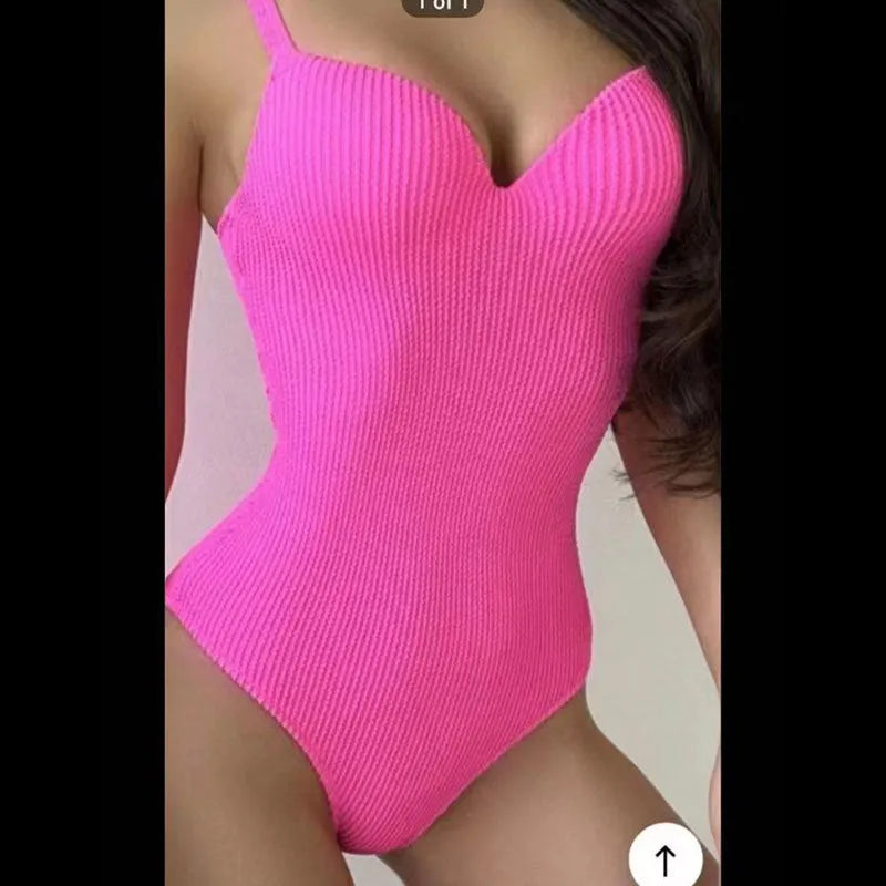 Women's one-piece swimsuit with sunken stripe pattern in polyester fabric available in multiple colours