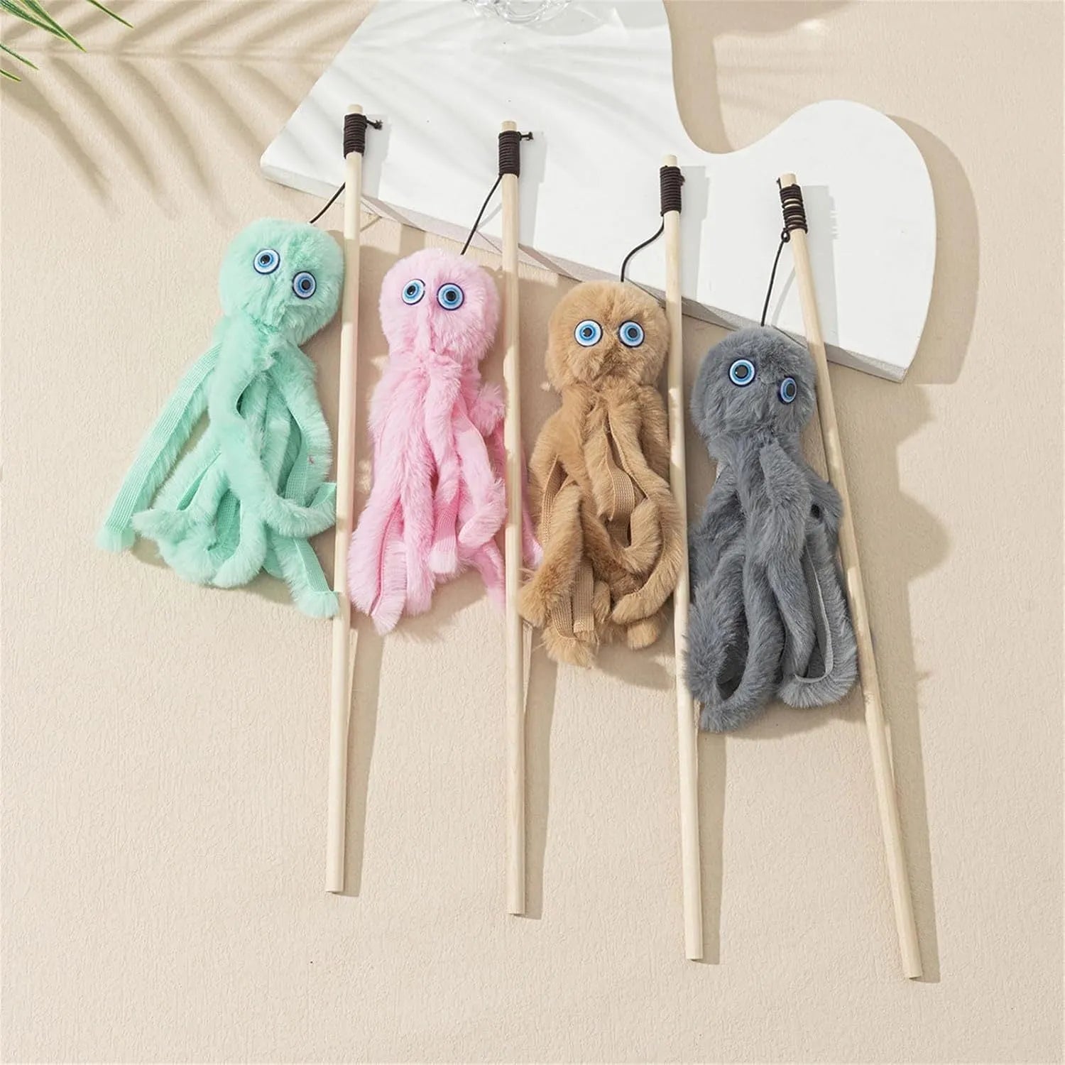 Octopus wand cat toy with moving eyes and flexible wand for indoor kitten play