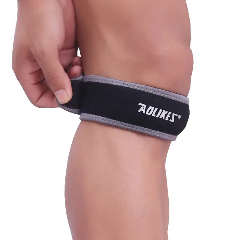 Black and grey patella retinaculum knee support for sports like running and cycling