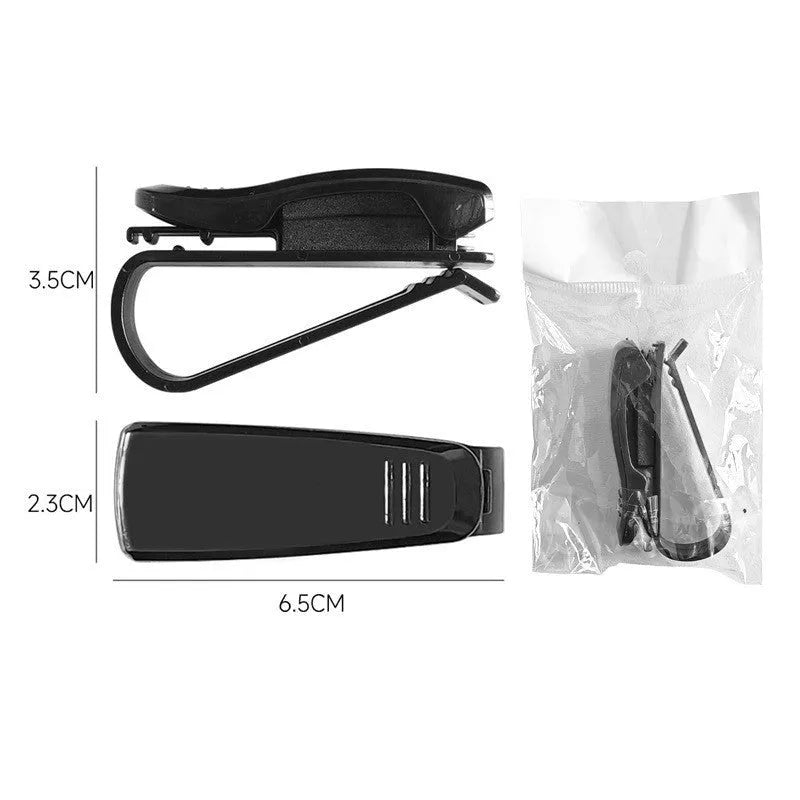 Black plastic car sunshade clip for holding glasses, tickets and ID cards, dimensions 6.5 by 2.3 centimetres