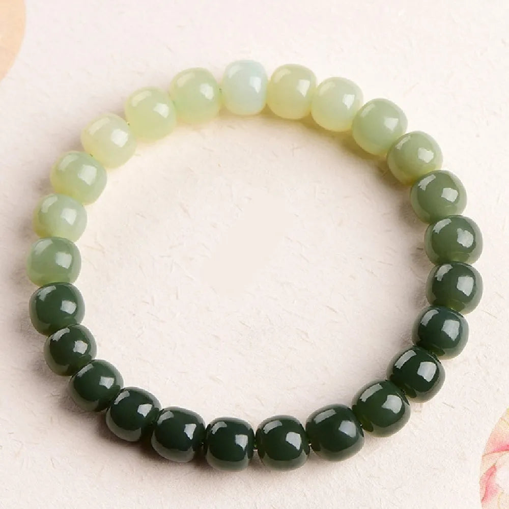 Natural Hetian jade bracelet with gradient clear water colour beads and sliding knot closure