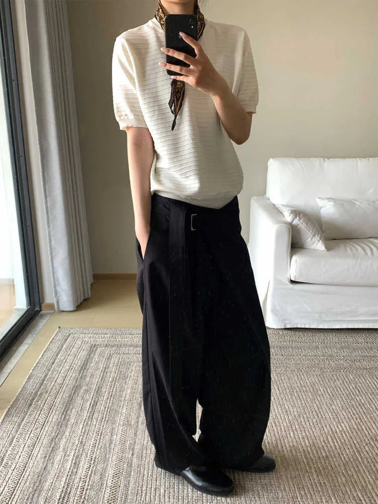 Black straight-leg trousers with adjustable waist and single pleated detail in tencel-cotton blend