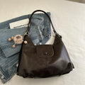 Large capacity PU leather commuter shoulder bag with mobile phone compartment in urban simplicity design