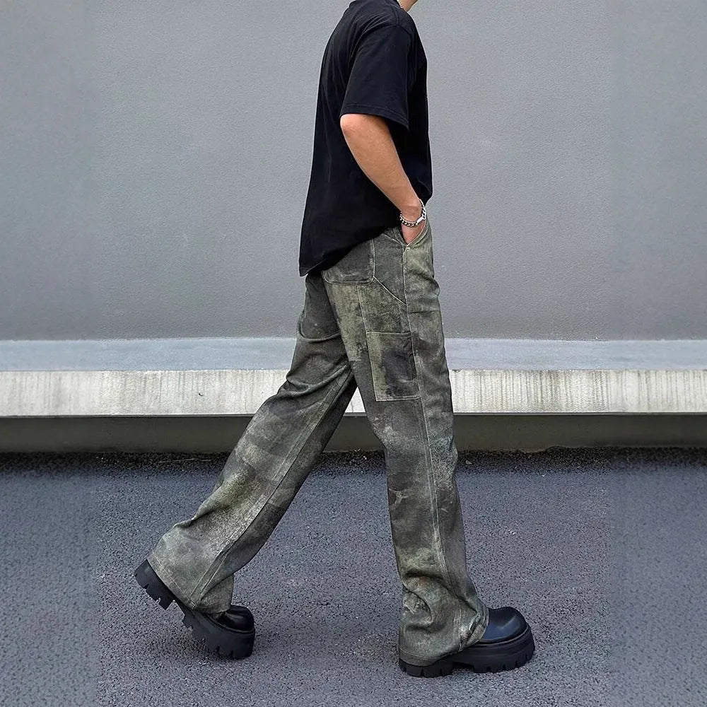Men's straight-leg jeans with a retro digital camouflage pattern on blue denim.