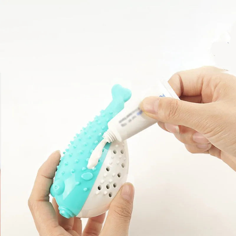 Blue silicone fish-shaped chew toy and teaser for cats on a white background.