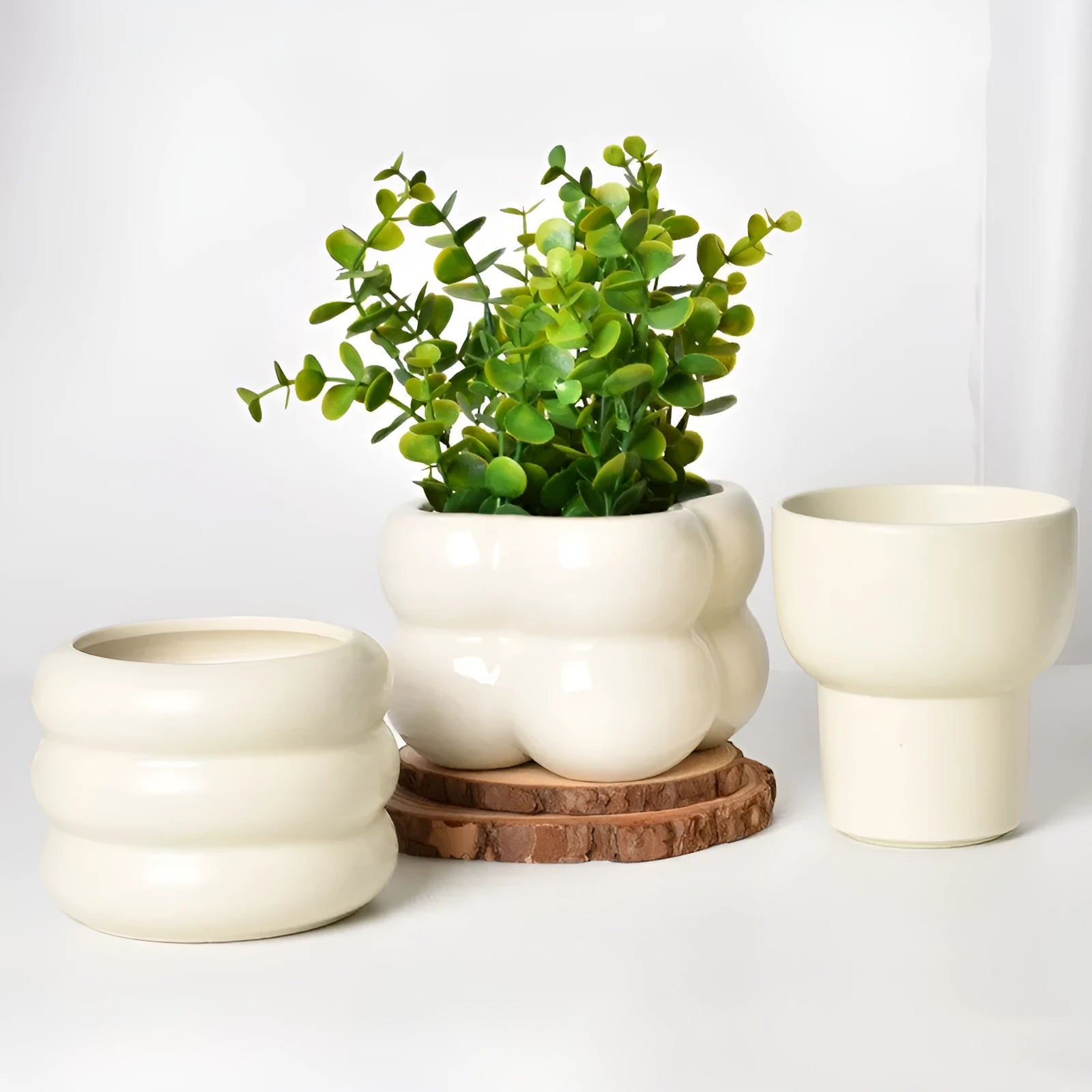 Roman column style matte yellow ceramic flowerpot for home plant decoration.