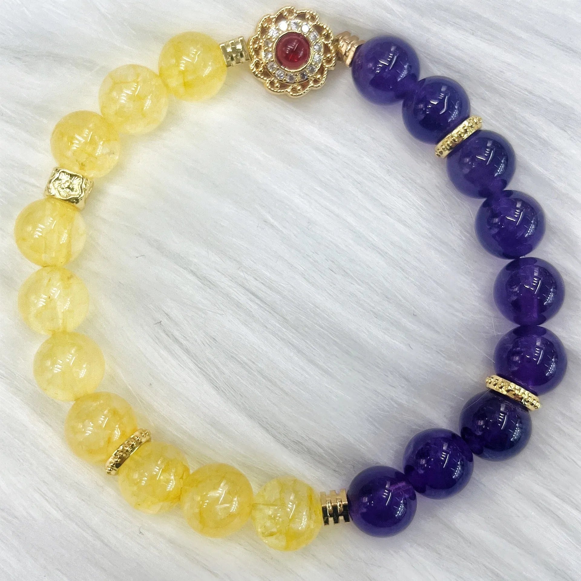 Handmade women's amethyst crystal bracelet with yellow and purple beads