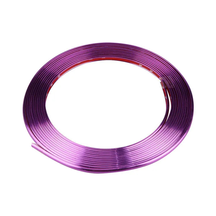 Roll of electroplated purple PVC wheel hub trim and a separate anti-collision strip on a white background.