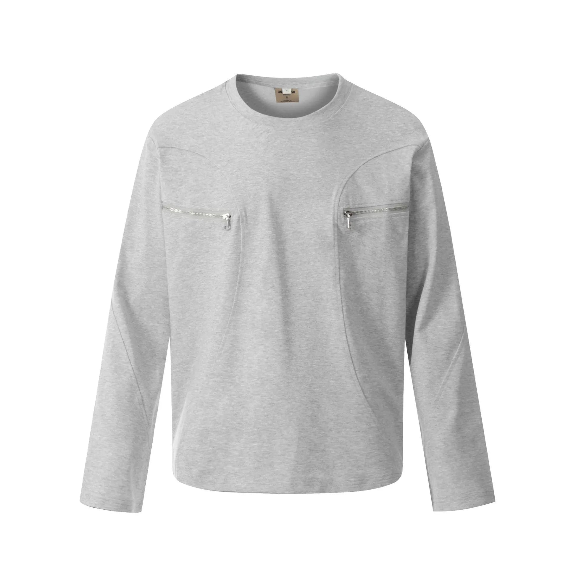 Man wearing a grey loose fit cotton long sleeve pullover with a simple retro design.