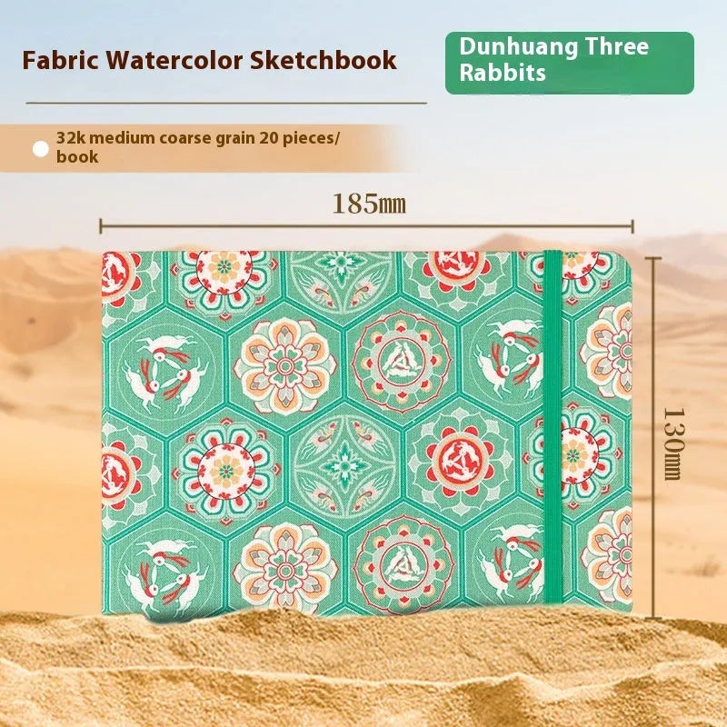 Feiluniao handmade fabric watercolour sketchbook with decorative cover, shown at 185mm length.