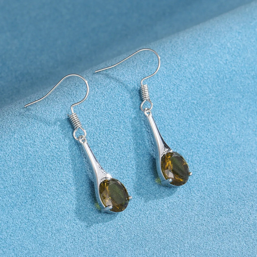 Olive green topaz drop earrings with water drop shape and gold electroplated finish