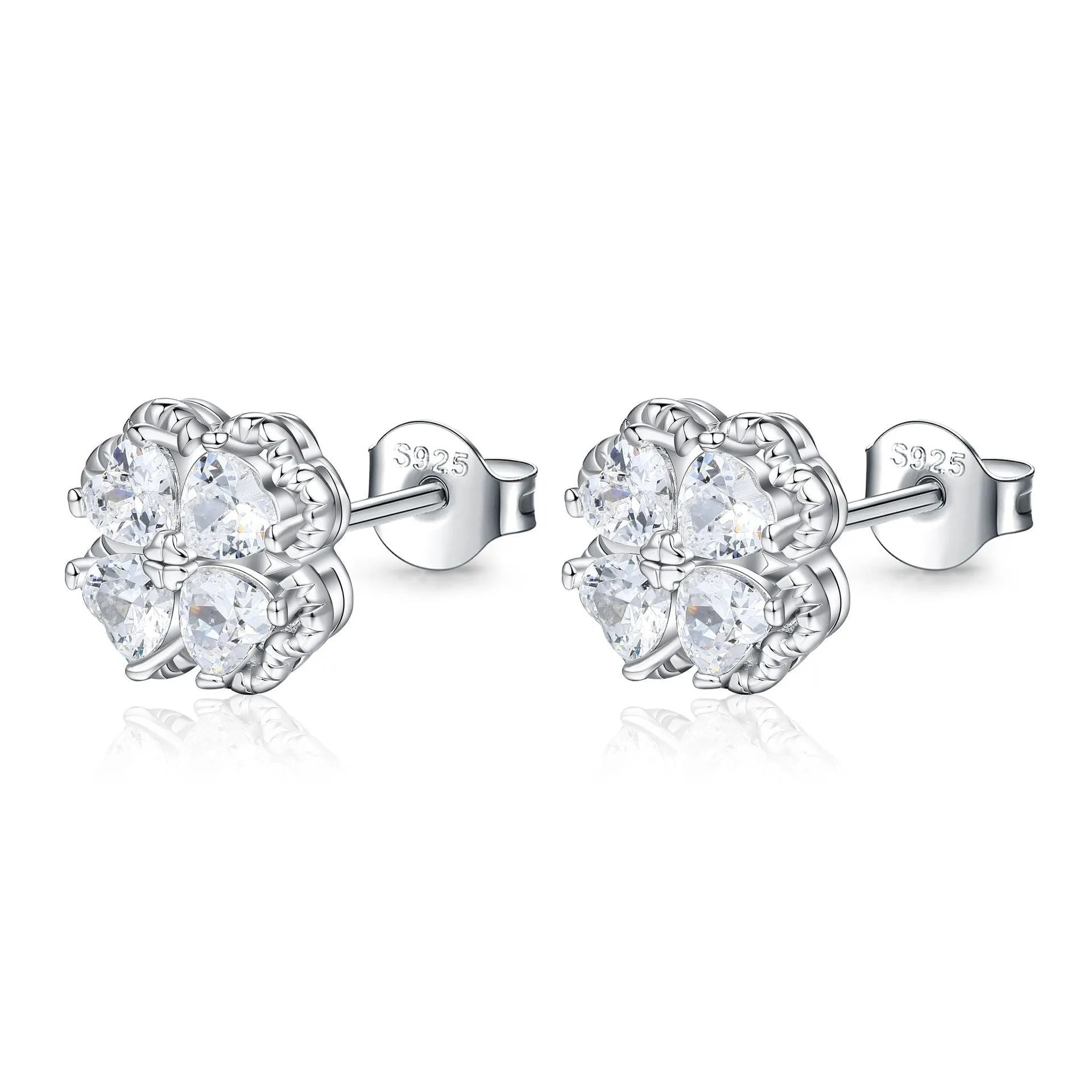 Pair of 925 silver heart-shaped earrings with inlaid zircon stones and a white gold colour finish.