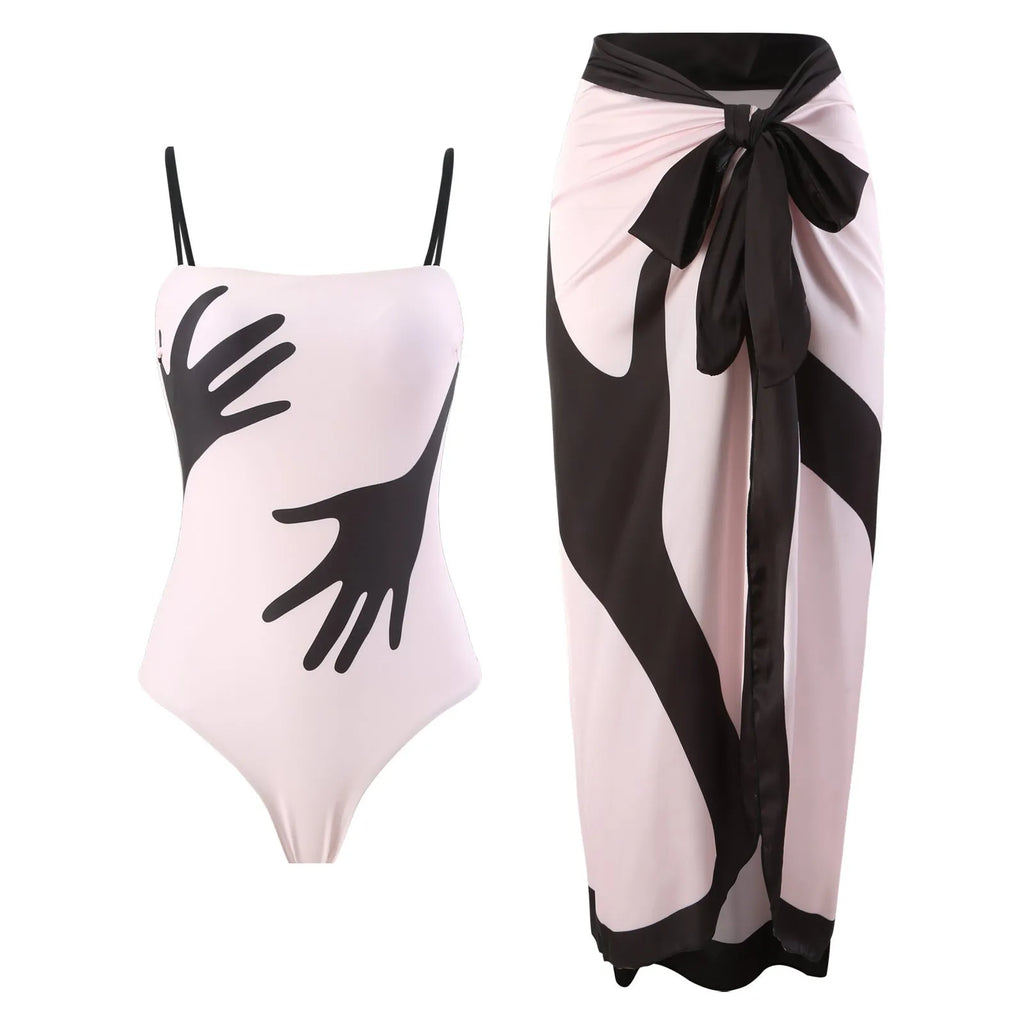 Women's patterned bikini swimsuit with a flowing white tulle skirt attached.