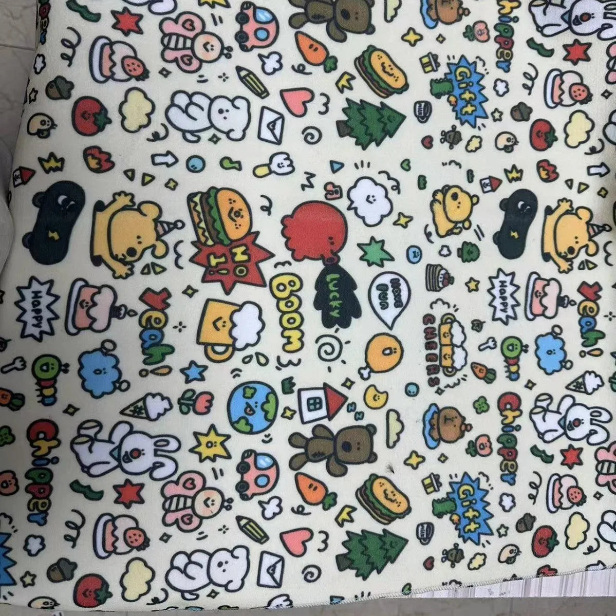 Blue Puppy cartoon print nylon cosmetic bag in medium size on a plain background.