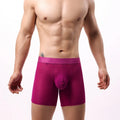Men's white lace mesh boxer shorts with low waist design on a plain background