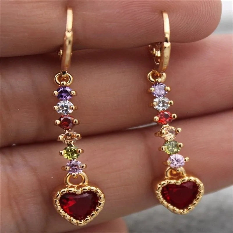 Women's gold and silver heart-shaped alloy earrings with electroplated finish