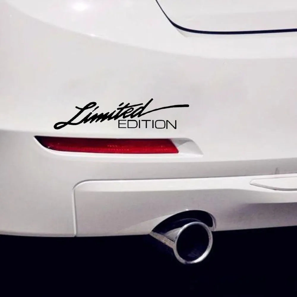 Close-up of a reflective plastic bumper sticker showing British style text, measuring 16cm long.