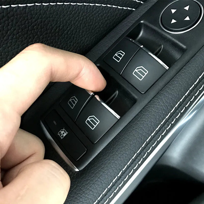 Black glitter adhesive sticker for covering a car window lift button.