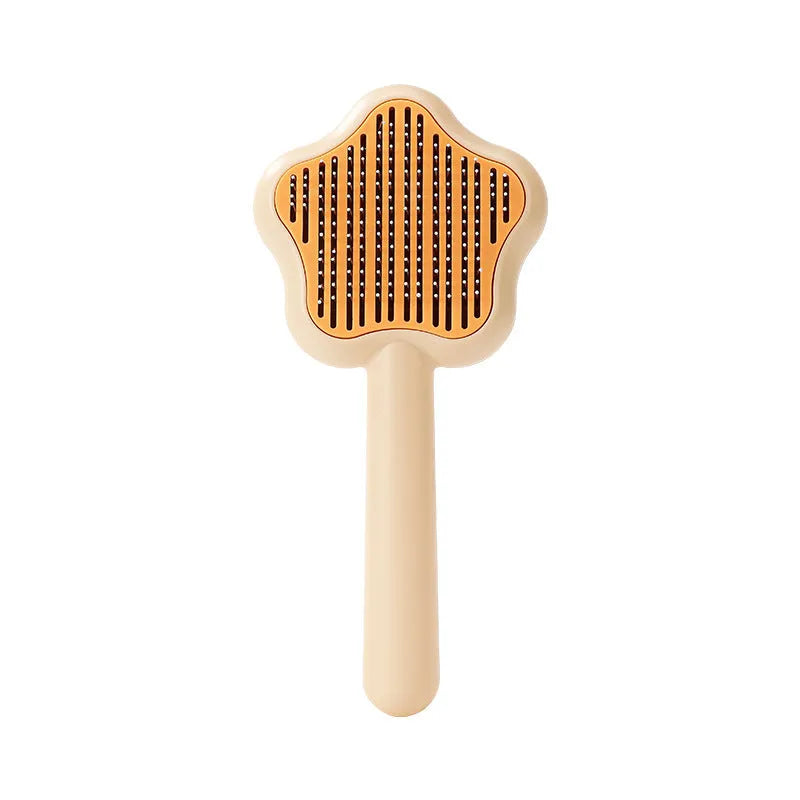 Green pet grooming comb with stainless steel needles and self-cleaning mechanism