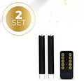 Set of four black S2 3D Flame LED taper candles showing realistic flickering light.