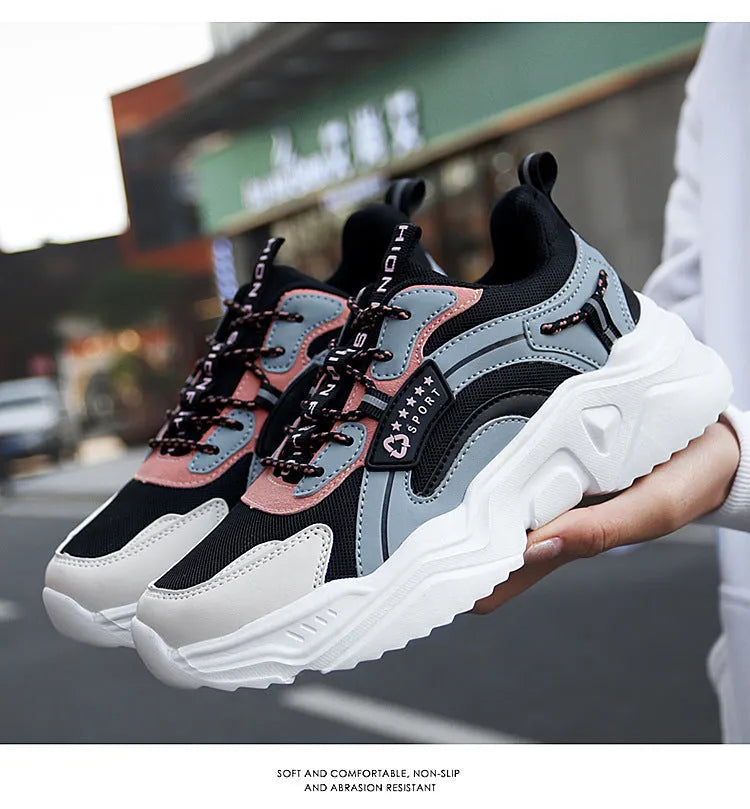 Women's white casual sports shoes with thick sole, mesh upper, buckle detail and round toe