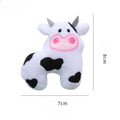 Cow shaped plush cat toy on a string handle with dangling feather, catnip inside.