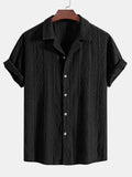 Men's loose fit short sleeve cardigan in solid colour on a hanger